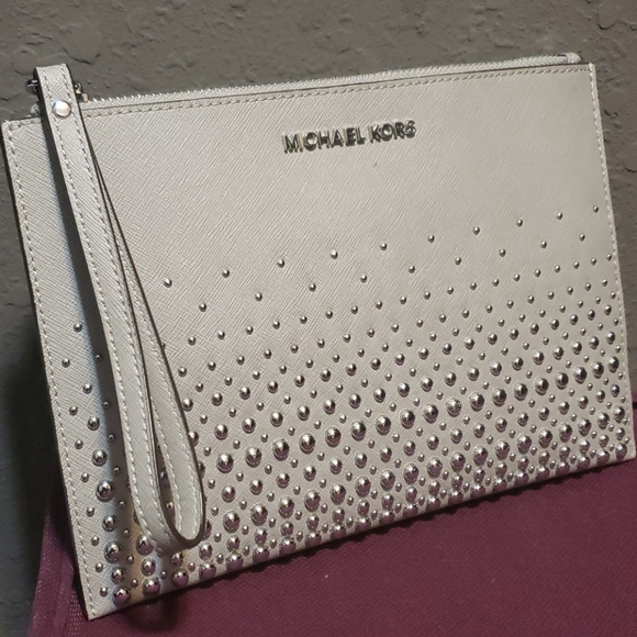 Michael Kors Handbags - NEW Michael Kors Studded Wristlet NWOT